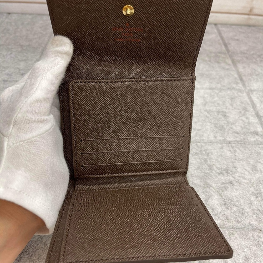 Louis Vuitton Damier Ebene Wallet - Picture 7 of 11